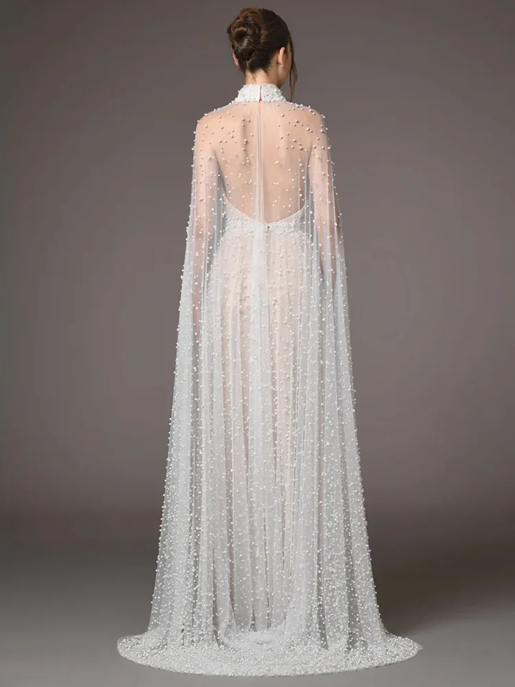 럭셔리 진주 장식 이브닝 드레스 하이 넥 홀터넥 케이프 허리 디테일 투명한 뒷면 사우디 스타일 가운 샴페인