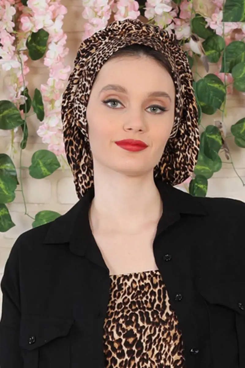 Motif léopard drapé, os peigné