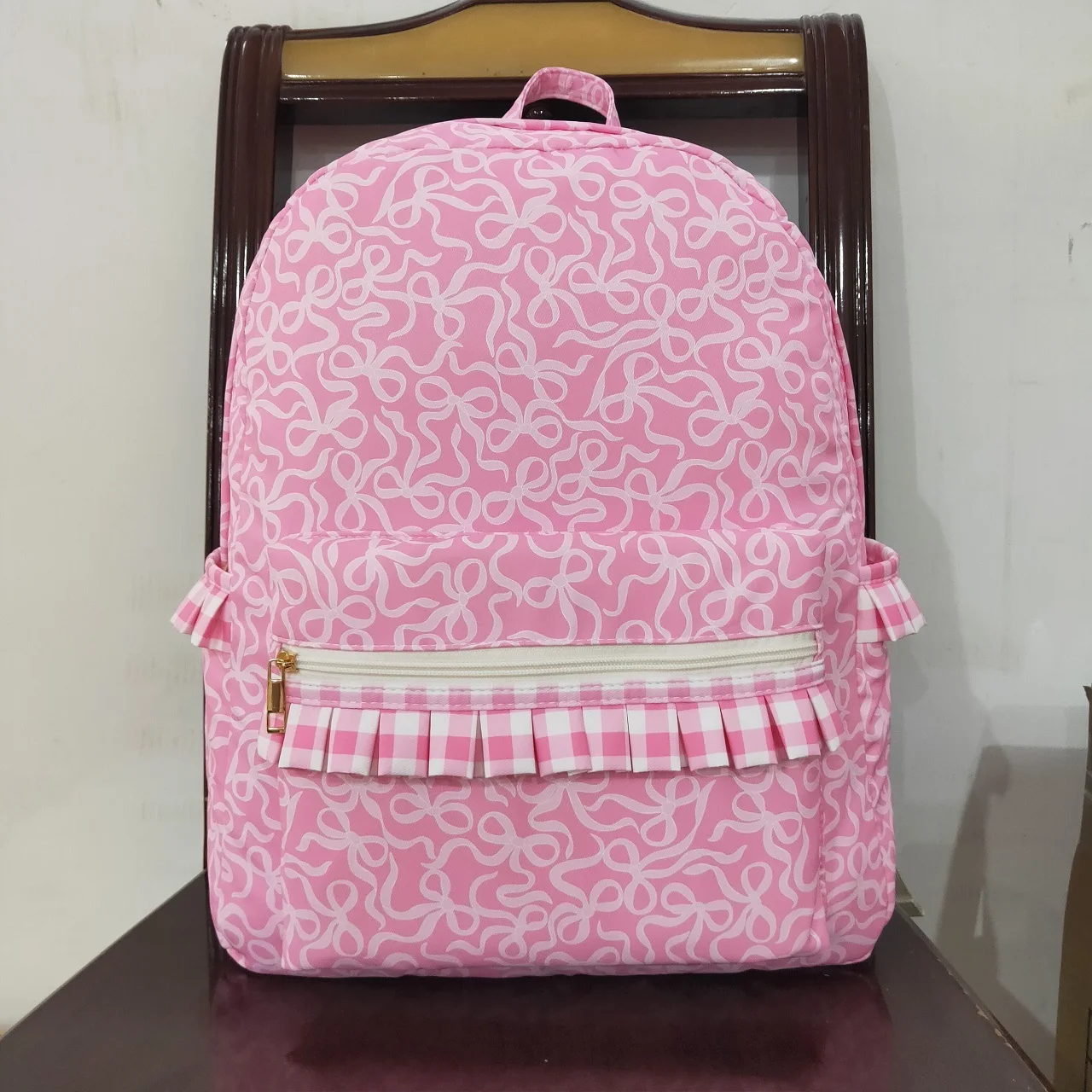 

Wholesale Children Pink Bows Outdoor Portable Kids School Toddler Checked Bag Baby Girl Boutique Plaid Ruffle Backpack Daypack