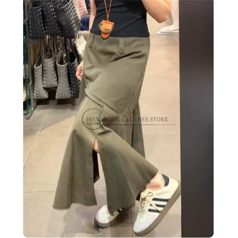 Grey-green irregular half-length skirt for women in summer. High-waisted and loose design. Large size. Fish tail style.