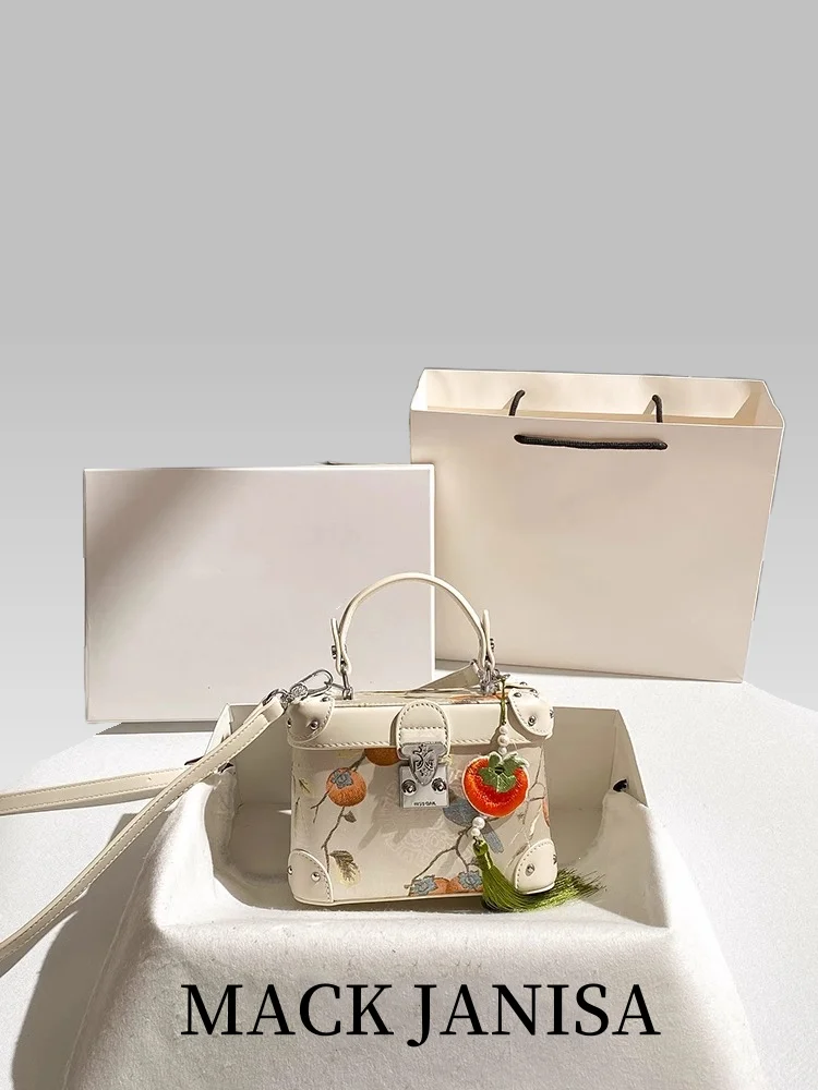 

Popular and Luxury Makeup Bag with Charming Embroidery Printing and Pendant Women's Stylish and Versatile Handheld Crossbody Bag