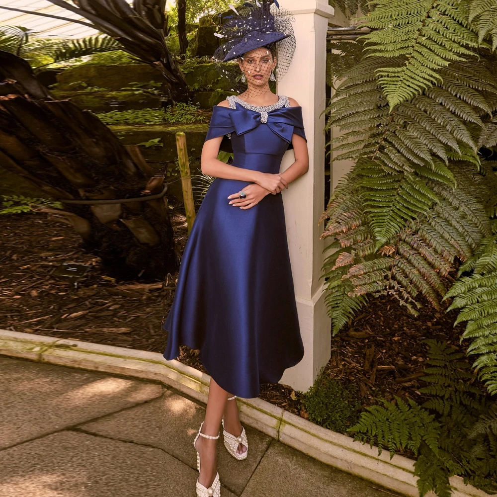 

Elegant Satin Mother of the Bride Dresses for Weddings O Neck Wedding Party Gowns Crystals Bow Tea-Length A-Line فستان سهرة