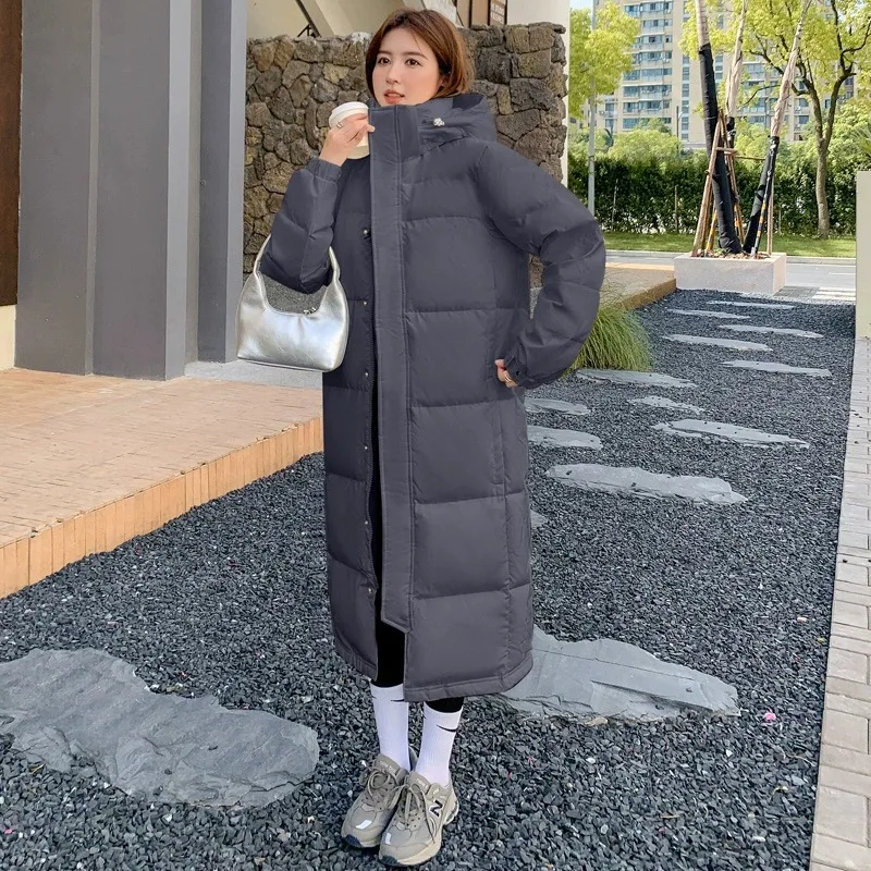 Chaqueta de plumón extendida para mujer, versión coreana 2024, con capucha por encima de la rodilla, chaqueta negra de invierno estilo Academia China tanto