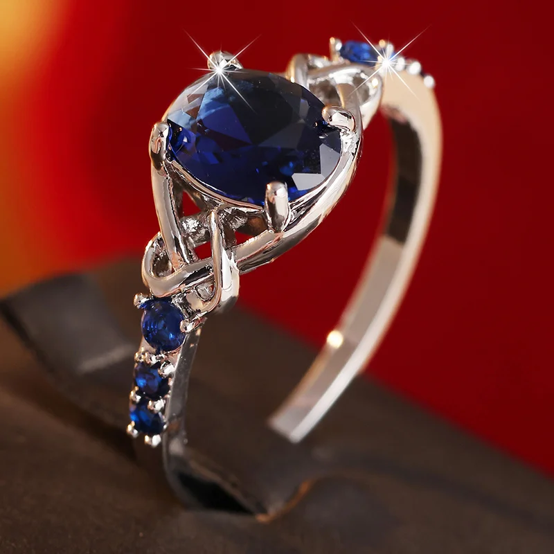 Vintage Hollowed Out Interwoven Design Women's Ring Inlay Blue Synthetic Zircon Elegant and Luxurious Ring Banquet Accessory