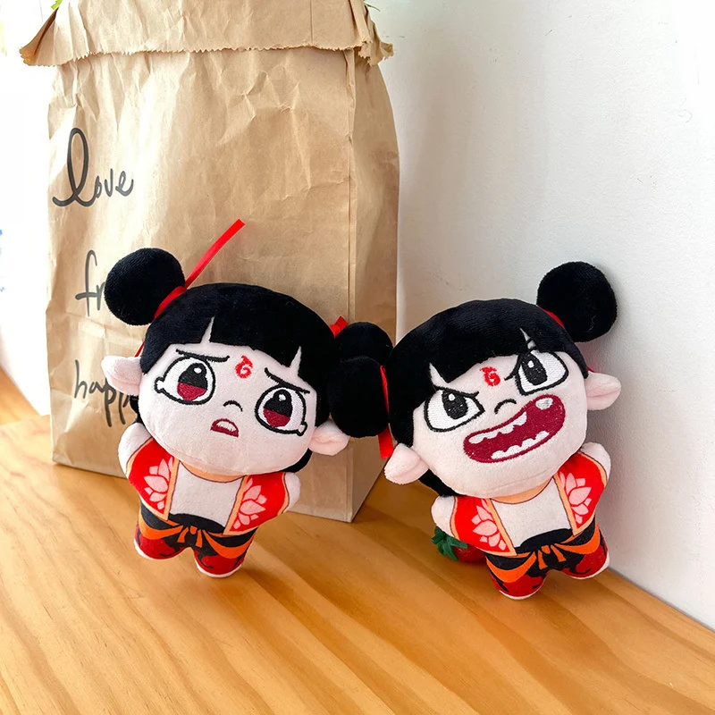 Ne Zha 2 colgante de felpa película de dibujos animados Nezha figura de peluche llavero 13cm varias expresiones muñecas juguetes regalos de cumpleaños