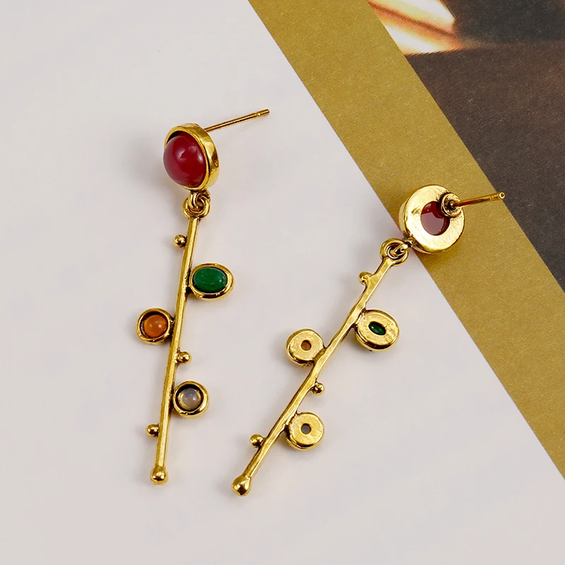 Fashionable, luxurious branches, fashionable metal earrings, glamorous accessories