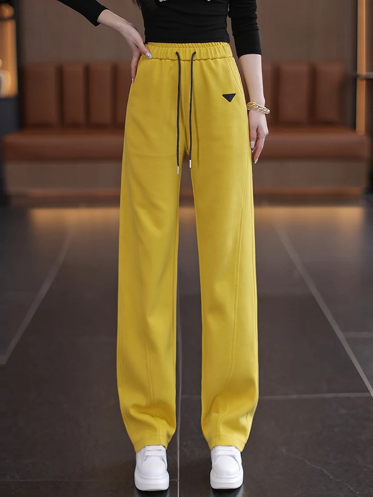 

Желтые спортивные брюки женские весна-осень 2026: новая модель, повседневные, зауженные, с широкими штанинами, с высокой талией, в уличном стиле