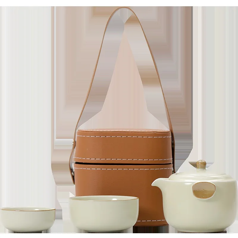 

Beige open film travel tea set portable bag outdoor portable teapot company event souvenir