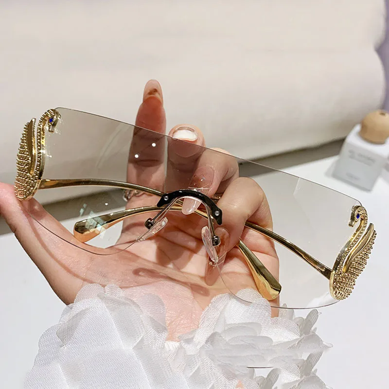 New y2k Vintage Rimless Swan Sunglasses Women For Men Luxury Brand Designer Sun Glasses Punk Popular One Piece Lens Pink Eyewear