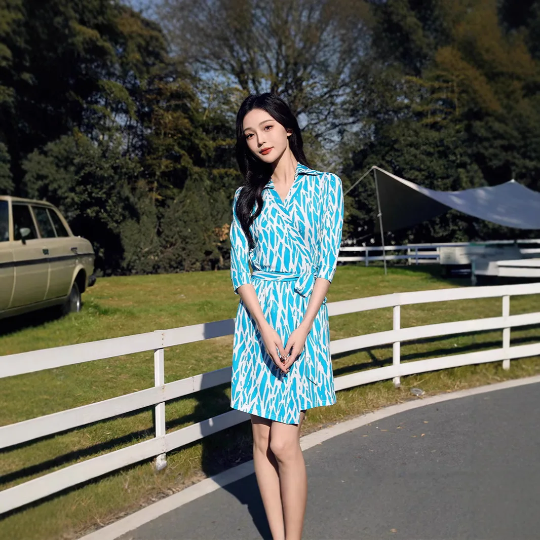 

Elegant Short Knitted Wrap Chest Dress with Geometric Print And Stand Collar in Blue And White Stretchy Fabric for Women