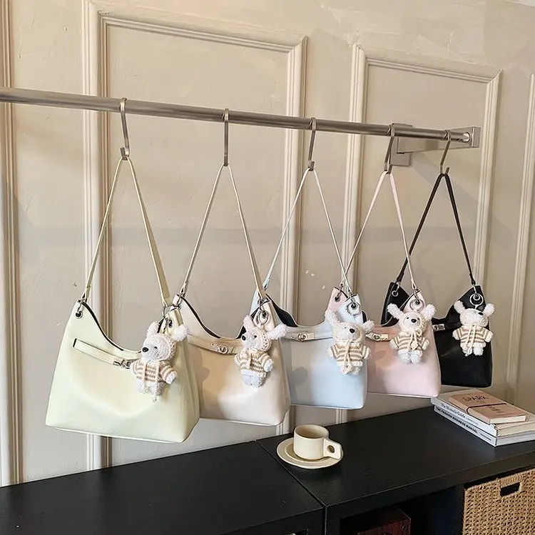 

Стильная и минималистичная сумка для подгузников для женщин, элегантная сумка через плечо, роскошная дизайнерская сумка-тоут, винтажная кожаная сумка-тоут большой вместимости.