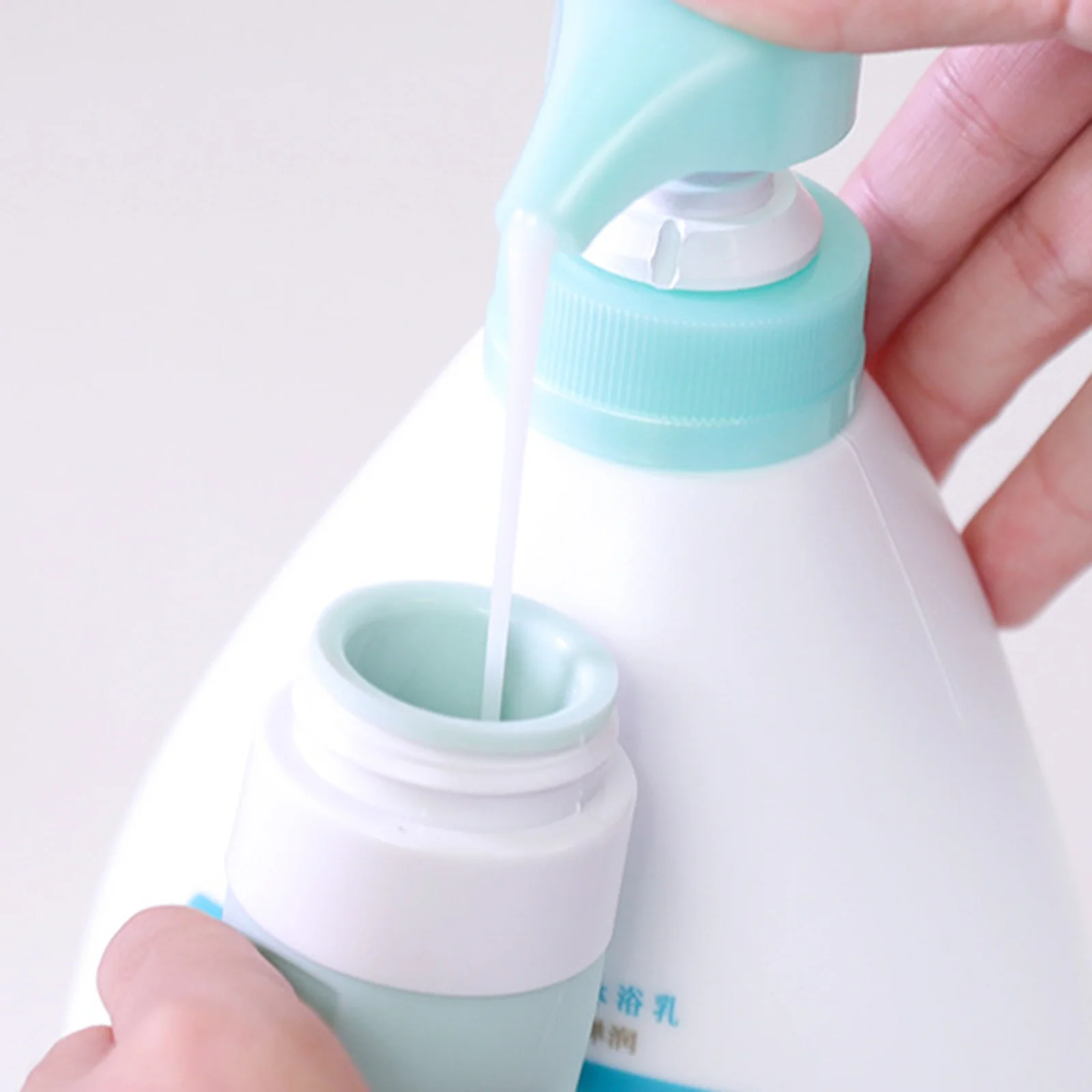 4Pcs Silicone Travel Bottles Hanging Leak-Proof Portable Lotion Containers Refillable Squeeze Travel Essentials