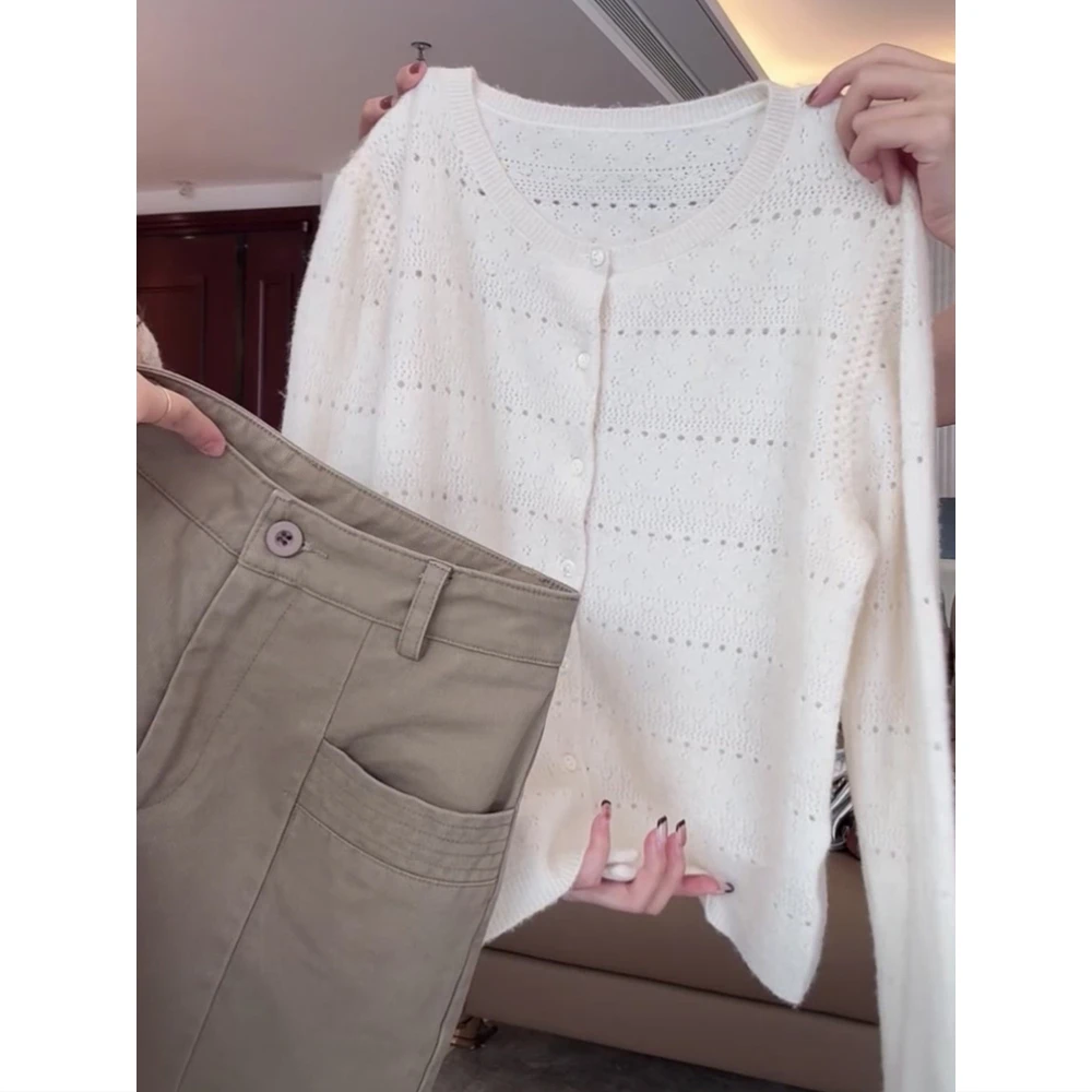 

Женские кардиганы и свитеры: весенние, асимметричные, укороченные, на пуговицах, тонкие, с капюшоном, в клетку, со съемными элементами, однотонные, с высоким воротником