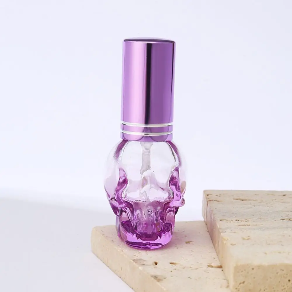 Botella recargable de Perfume con diseño de calavera, botella pulverizadora de vidrio de alta gama de lujo de 8ml, atomizador de Perfume de niebla fina, subembotellado