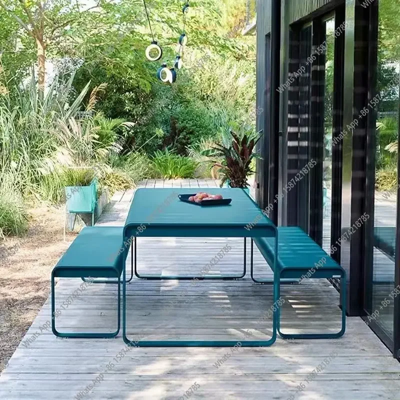 A63 New outdoor rattan table and chair combination balcony casual layout style open-air designer
