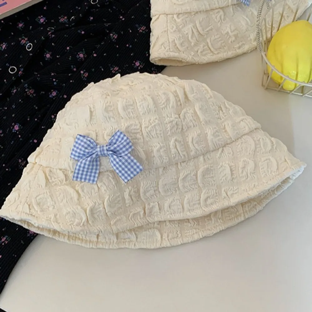 

Korean Bow Bucket Caps Stylish Lightweight Seersucker Caps Casual Sweet Sunscreen Hat Travel