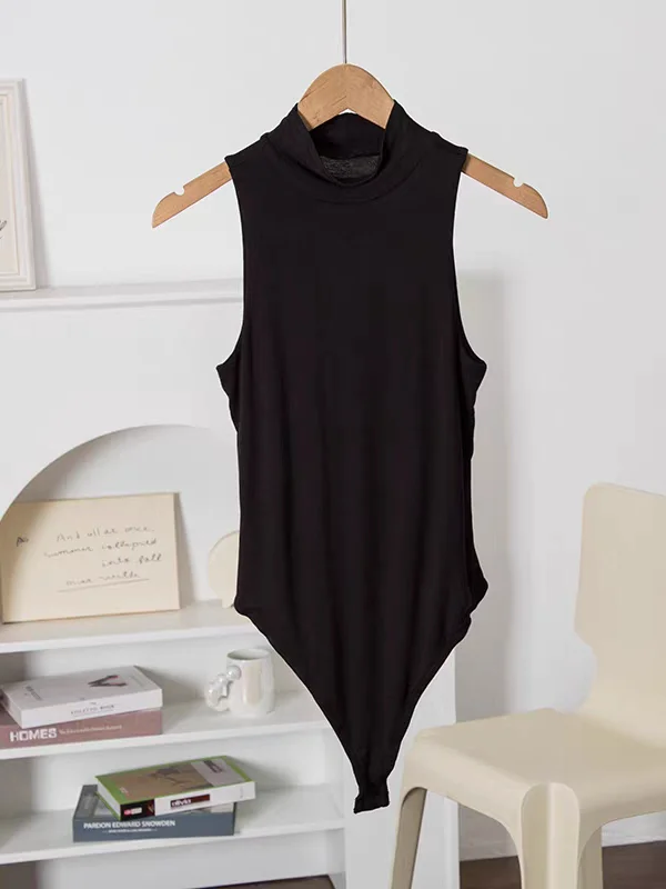 تصميم أمريكي بسيط مع انسيابية ومرنة للغاية! بلوزة نسائية بدون أكمام ذات ياقة عالية بلون واحد