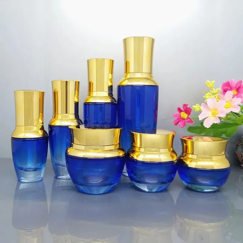 

8pcs/lot Blue Glass 50ml Cosmetic Emulsion Press Pump Refillable Package Bottle 20/30g Top Grade Makeup Facial Cream Jar Box Set