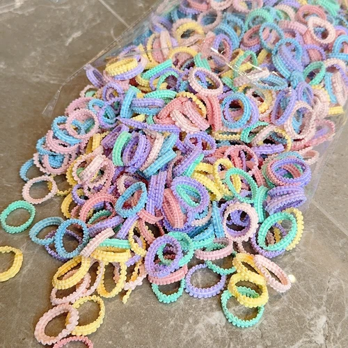 Imagen 2 del producto Banda de goma para bebé de 50/100 piezas, no daña el cabello, Anillo para el pulgar pequeño, hilo elástico alto, conjunto de Scrunchies sin costuras