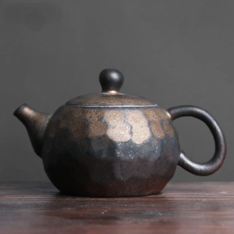 

Jingdezhen Kiln Blackened Gold Hammer Pattern Xishi Teapot Raw Ore Rough Pottery Handmade Pottery Kung Fu Hand-held Teapot