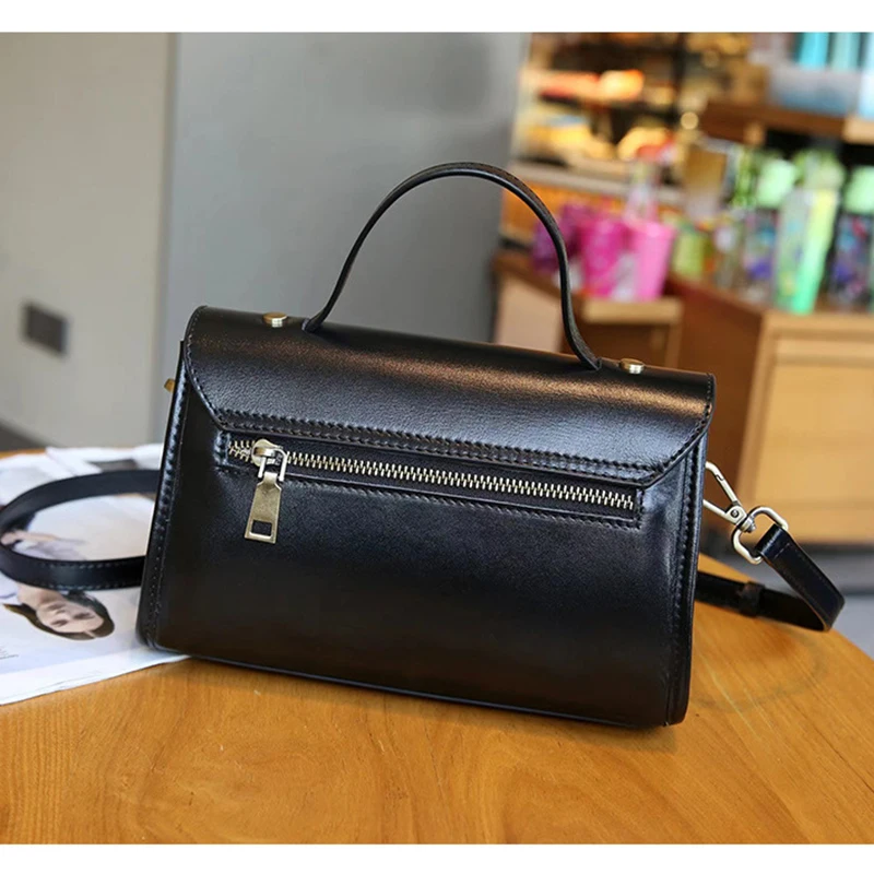 Europe and the United States fashion oblique cross bag 2024 leather new casual hand female baotou layer plant tanned cow leather