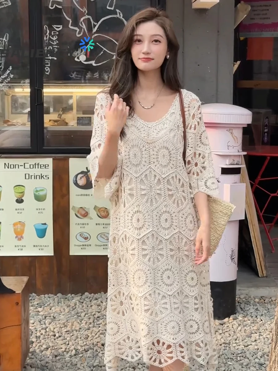 SALIENCY Abito francese in maglia all'uncinetto scavato femminile 2025 Primavera ed estate Nuova eleganza senior Gonna in maglia smockata allentata
