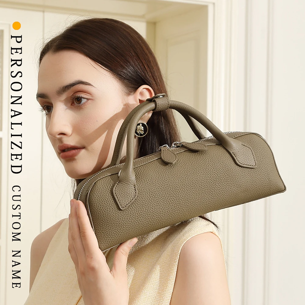 

Top layer cowhide hand-held underarm women's bag large capacity commuting one-shoulder long sausage bag free customization