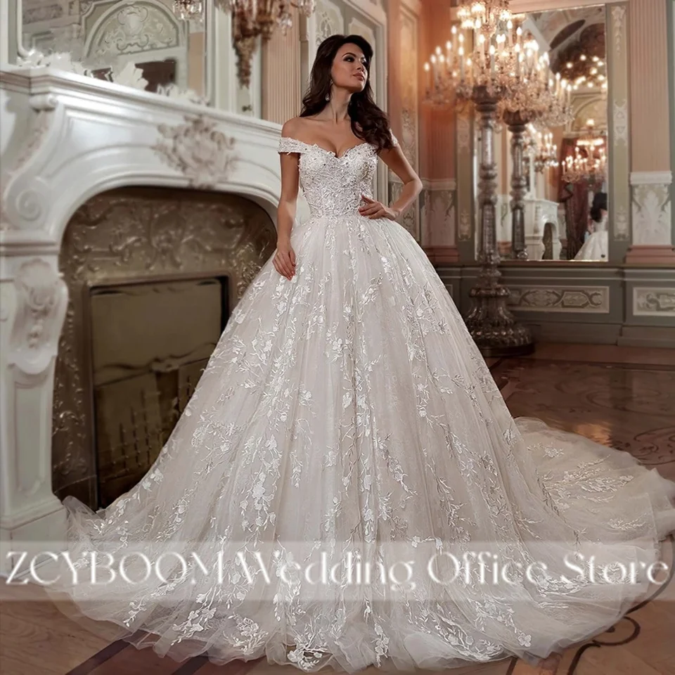 ชุดแต่งงานทรงบอลกาวน์แบบเปิดไหล่สีแชมเปญสุดหรู ปี 2022 คอวีประดับลูกไม้ผูกเชือกสไตล์เจ้าหญิง ชุดเจ้าสาว Vestidos De Novia