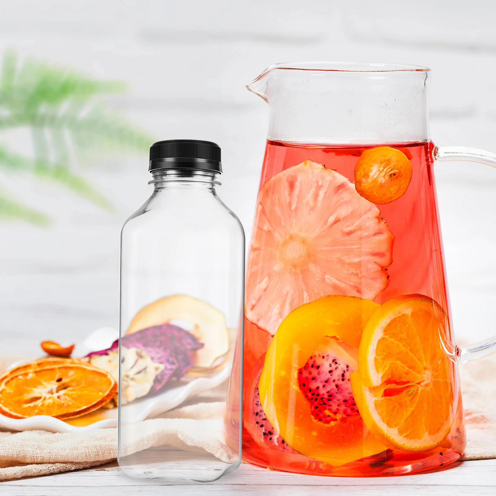 

8Pcs Clear PET Storage Bottles with Lids Empty Juice Containers for Drinks Liquids Kitchen Organization Black Caps Included