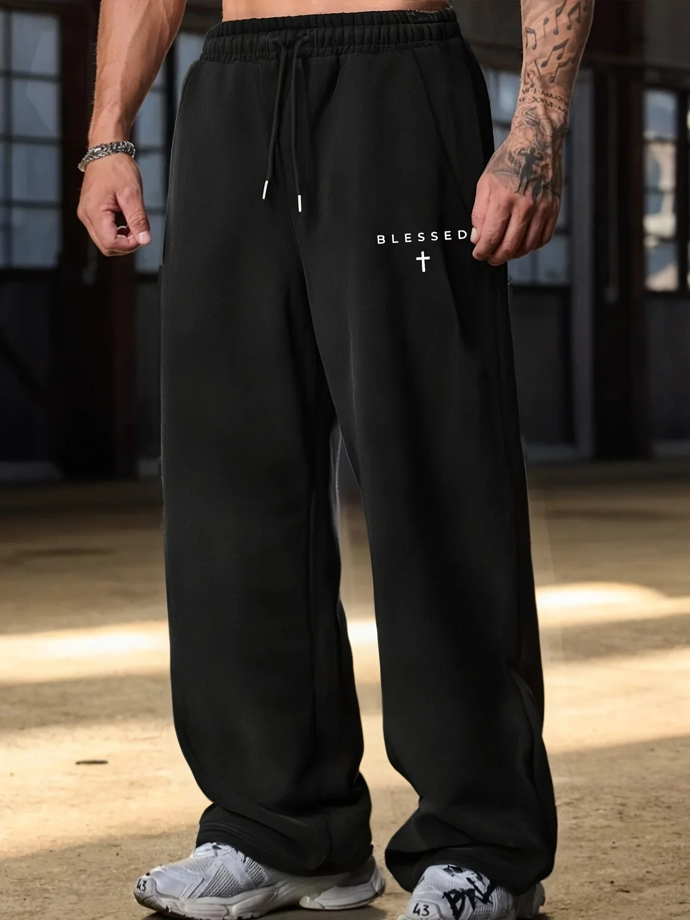 Black casual wide-leg pants, drawstring elastic waistband, suitable for both men and women for cold seasons and providing warmth