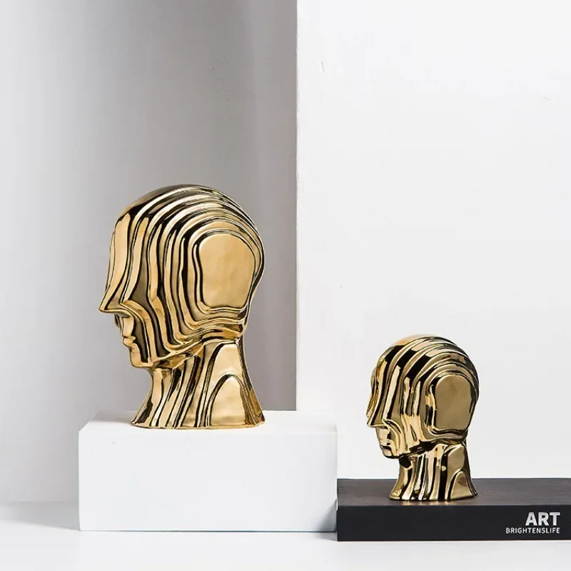 

Abstract figure sculpture Ceramic geometric head fringe Golden man alien decorative figurines home decoration accessories