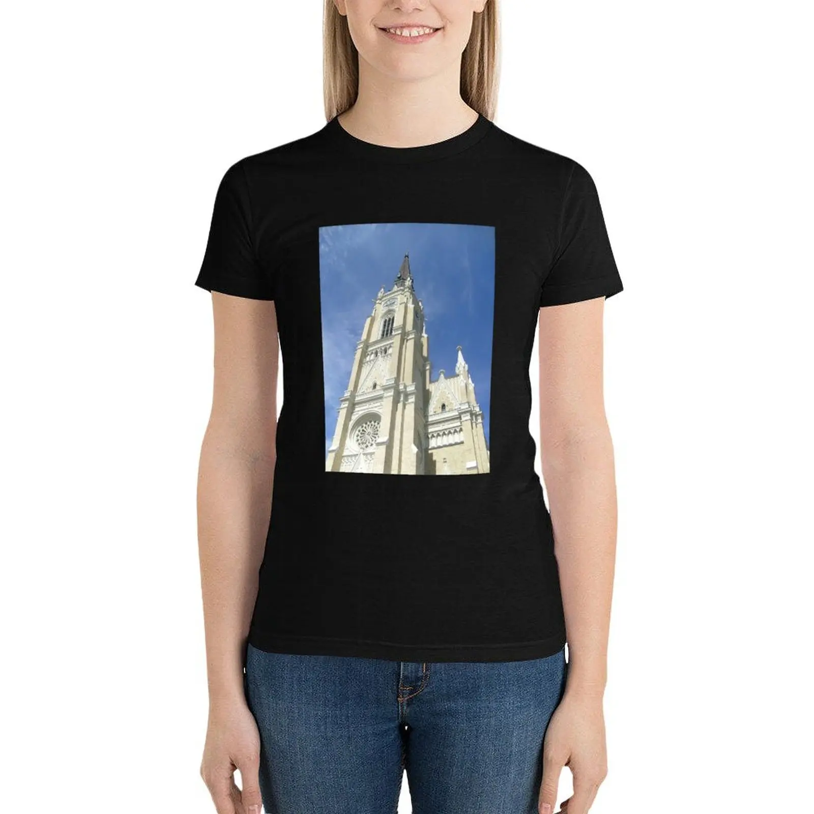 View of the bell tower of the cathedral in Novi Sad T-Shirt oversized tops graphics workout shirts for Women loose fit