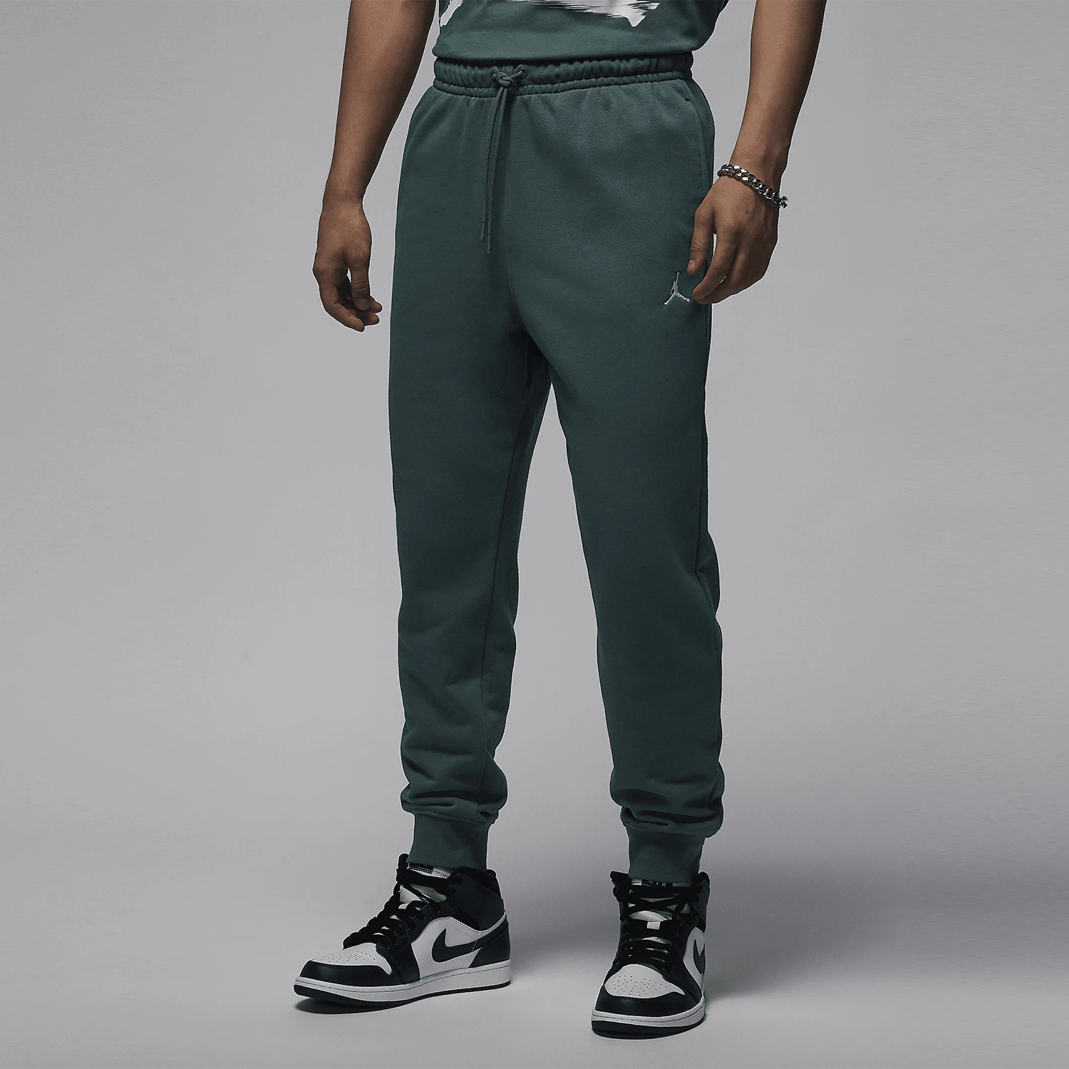 

Оригинальные мужские спортивные повседневные прочные брюки с манжетами Nike JORDAN FV7280-366
