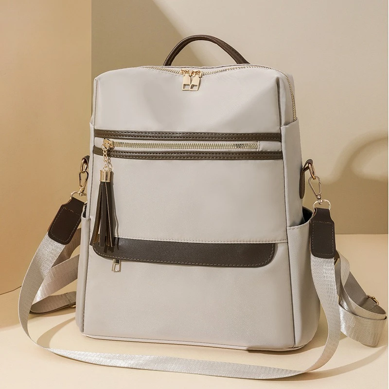 Europe and the United States portable nylon shoulder bag women's leisure light multi-purpose large-capacity backpack travel bag.