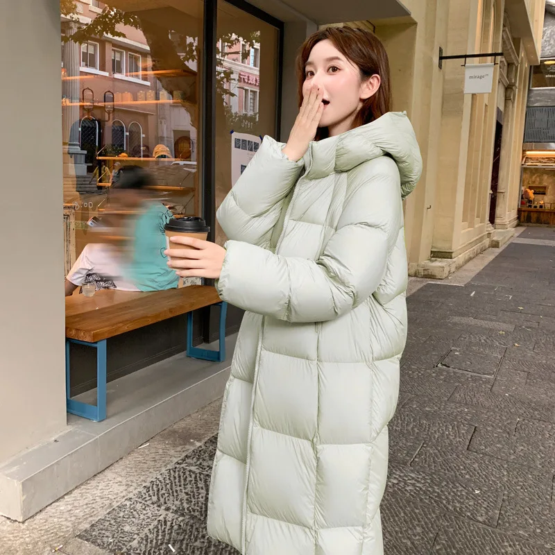 Langer warmer, mit Baumwolle gefütterter Mantel 2025, Winter, neue Daunenjacke für Damen, Parkas, koreanischer gepolsterter Kapuzenmantel, lockerer Modemantel für Damen