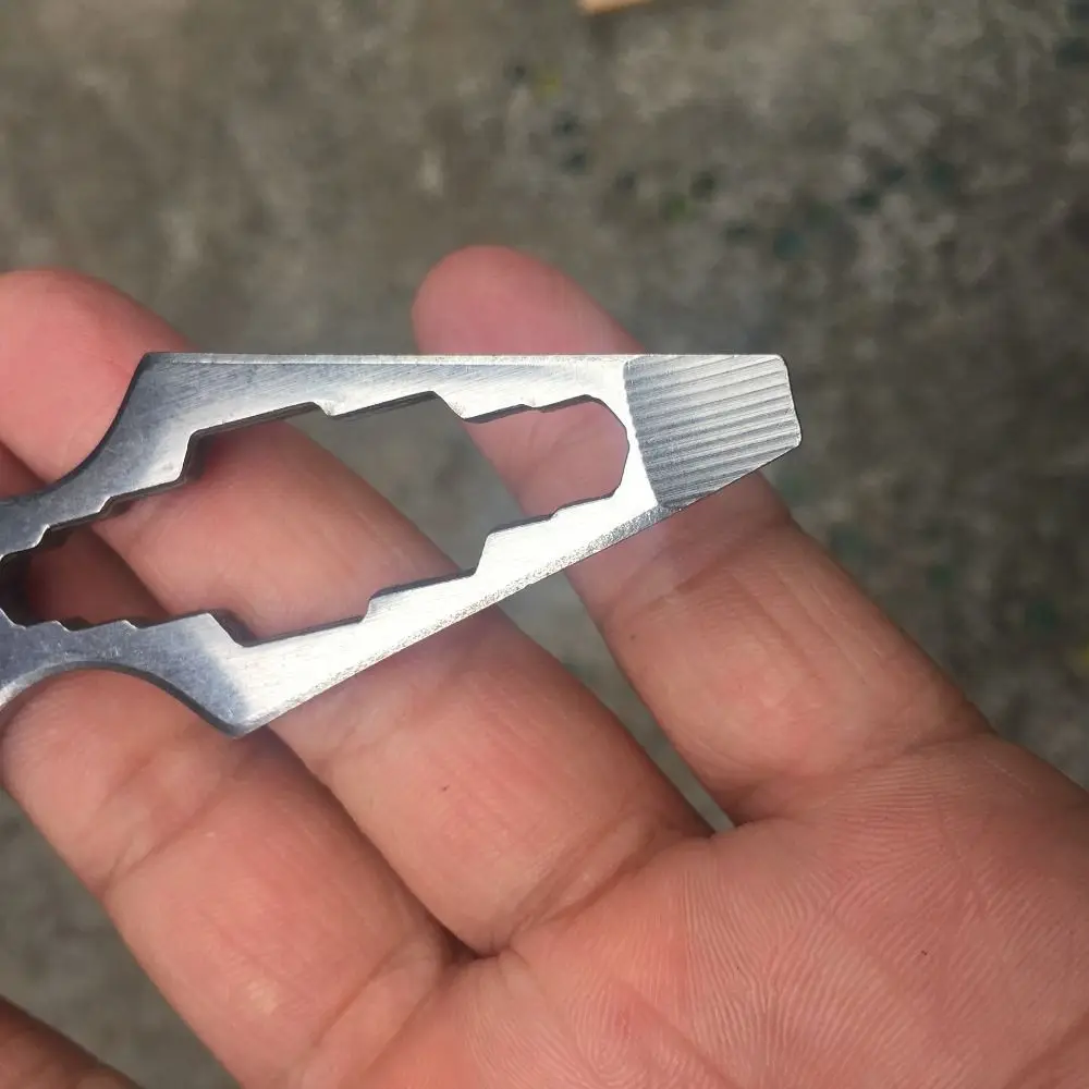 

Internal Angle Wrench EDC Self-defense Spiked Bottle Opener Corkscrew Screwdriver Camping Spiked Defense Multi-functional