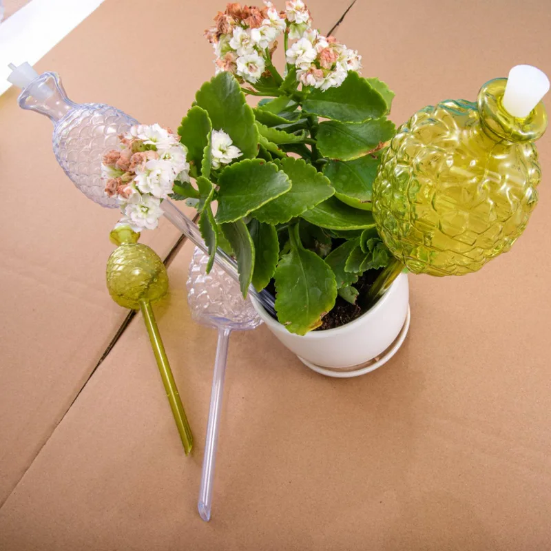 

Автоматическая система полива для растений в горшках с имитацией стекла, имитирующая ананас, для ленивого садовода.