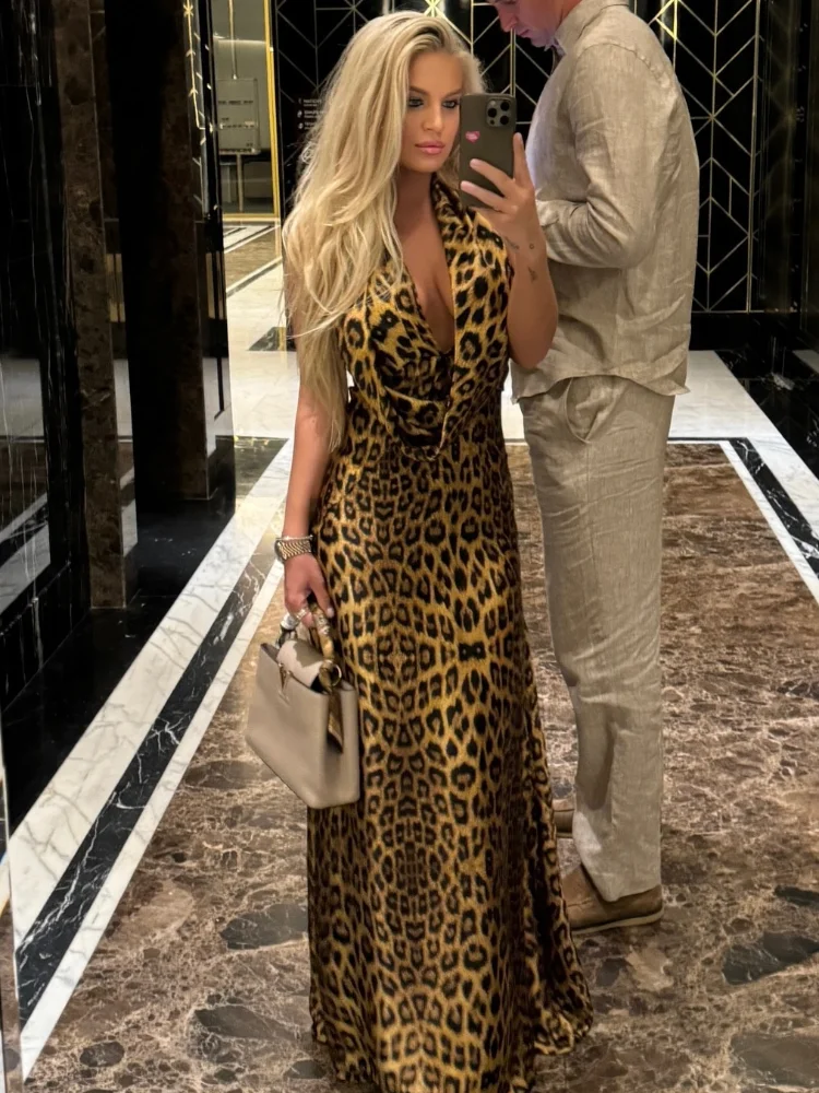 Sexy Leoparden bedrucktes rücken freies Kleid mit hängendem Hals für Damenmode Schnürung ärmel ige Plissee-Maxi kleider 2024 Lady High Streetwear