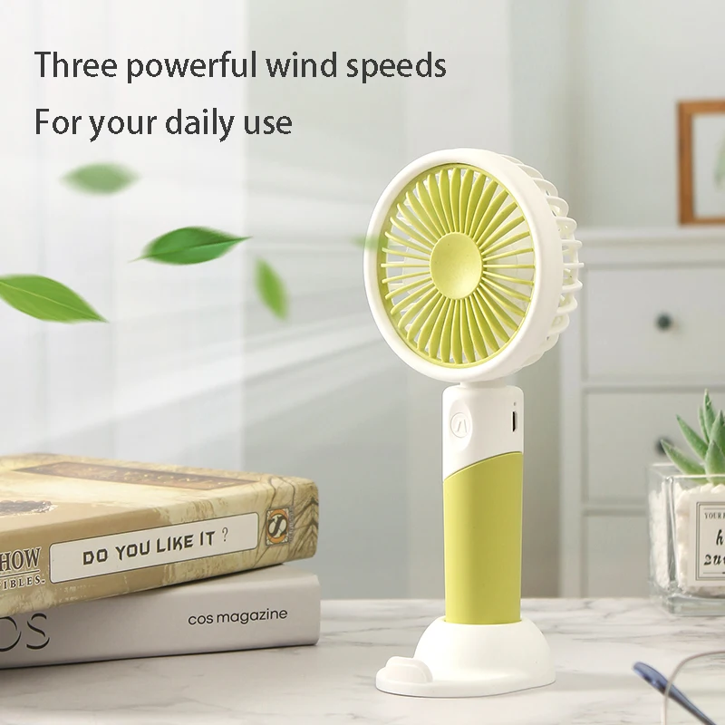 

Handheld fan 2024 three-speed mute USB rechargeable portable small electric fan multifunctional base cell phone stand