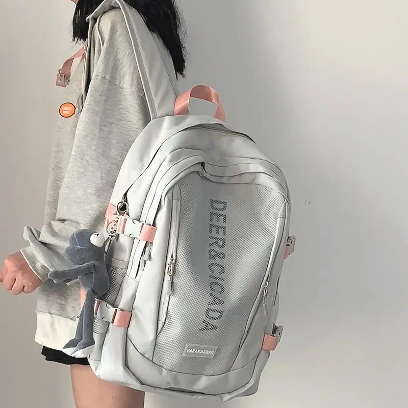 

Японская новая модель Sle 2025 Высокая Capaci объединитель для отдыха и путешествий Мужская школьная двойная сумка через плечо Простой дизайн