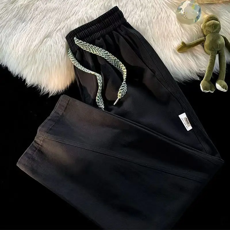 Spring Autumn New Fashion Elastic Waist Drawstring Solid Color Men\'s Clothing All-match Pocket Loose Trend Korean Straight pants