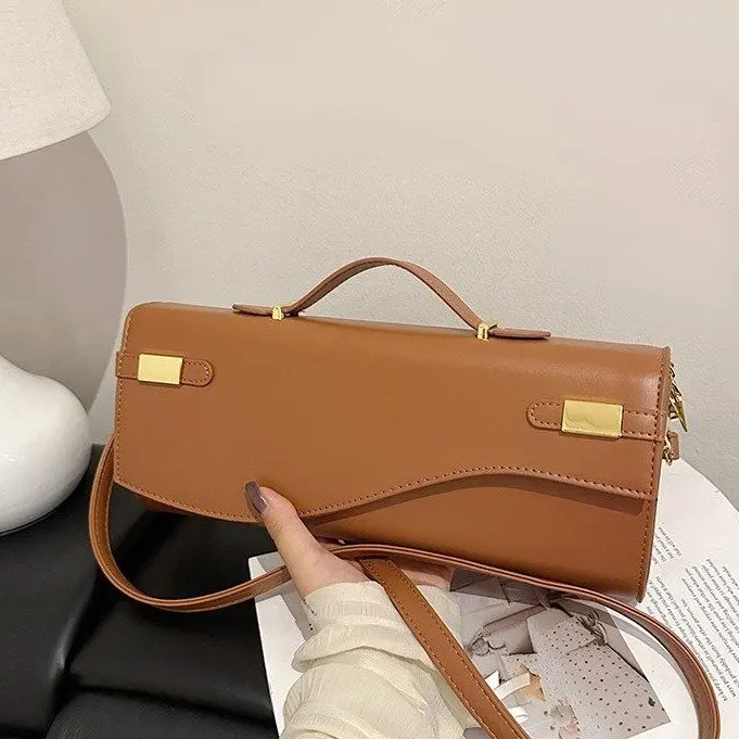 กระเป๋า Kelly ลายหนังจระเข้รุ่นใหม่ ปี 2025 - กระเป๋าสะพายไหล่/ถือได้หลายแบบ, กระเป๋าคลัทช์สำหรับออกงานกลางคืนสุดหรู พร้อมสายสะพายถอดได้