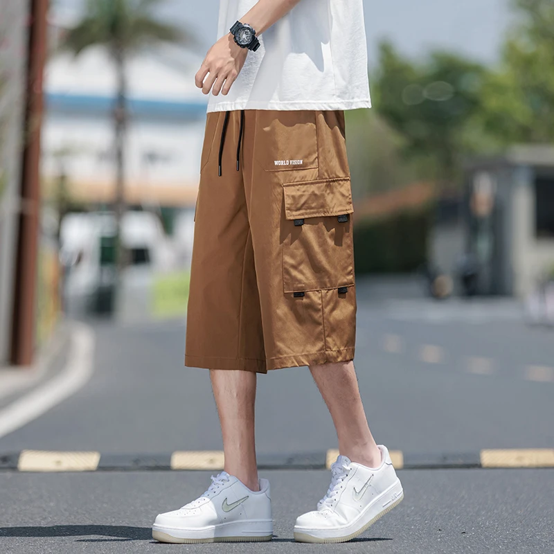 شورت رجالي عصري فضفاض - مناسب للشحن بتصميم معاصر وجيوب متعددة رائعة للمغامرة والمغامرة - أنماط جاهزة