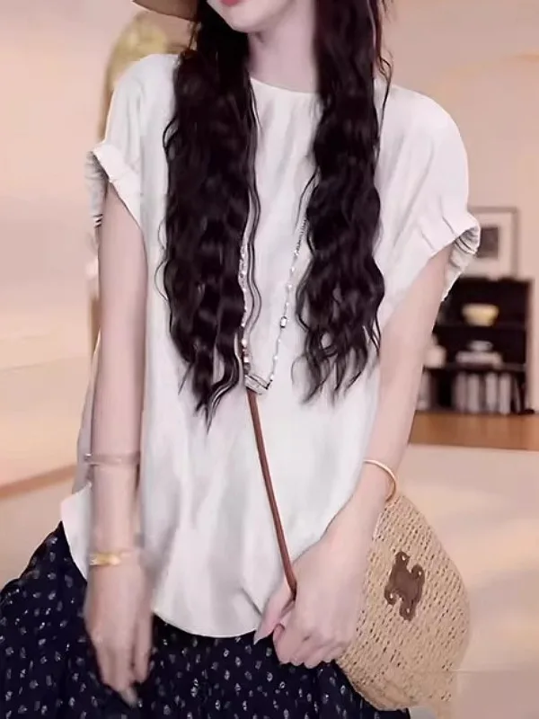 Letnia koszulka damska plus size, luźny krój, cienka, zapinana na guziki, styl koreański, modelująca sylwetkę typu gruszka.