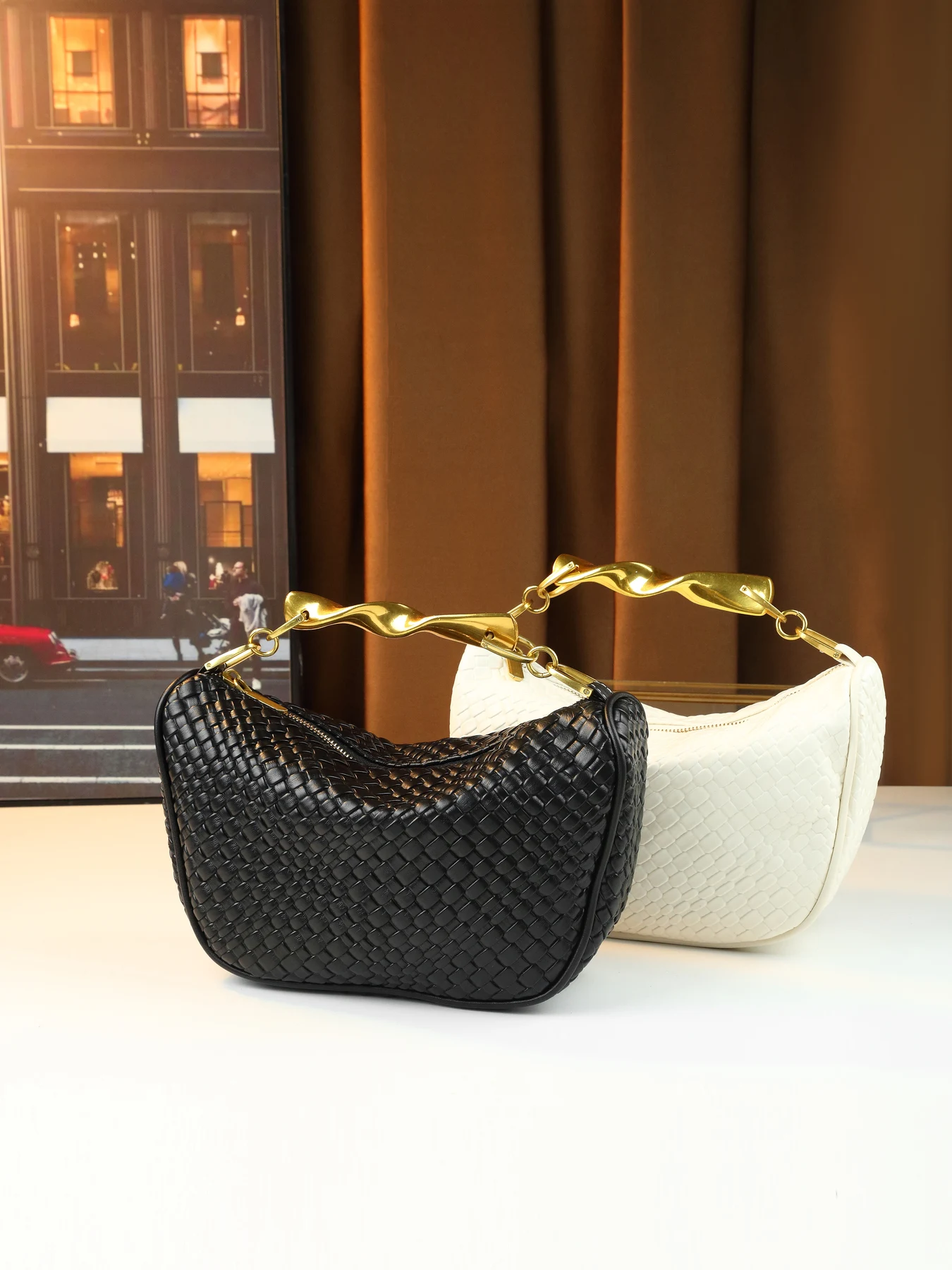 Simple and foreign women's versatile woven dumpling bag creative wave metal hand design handbag