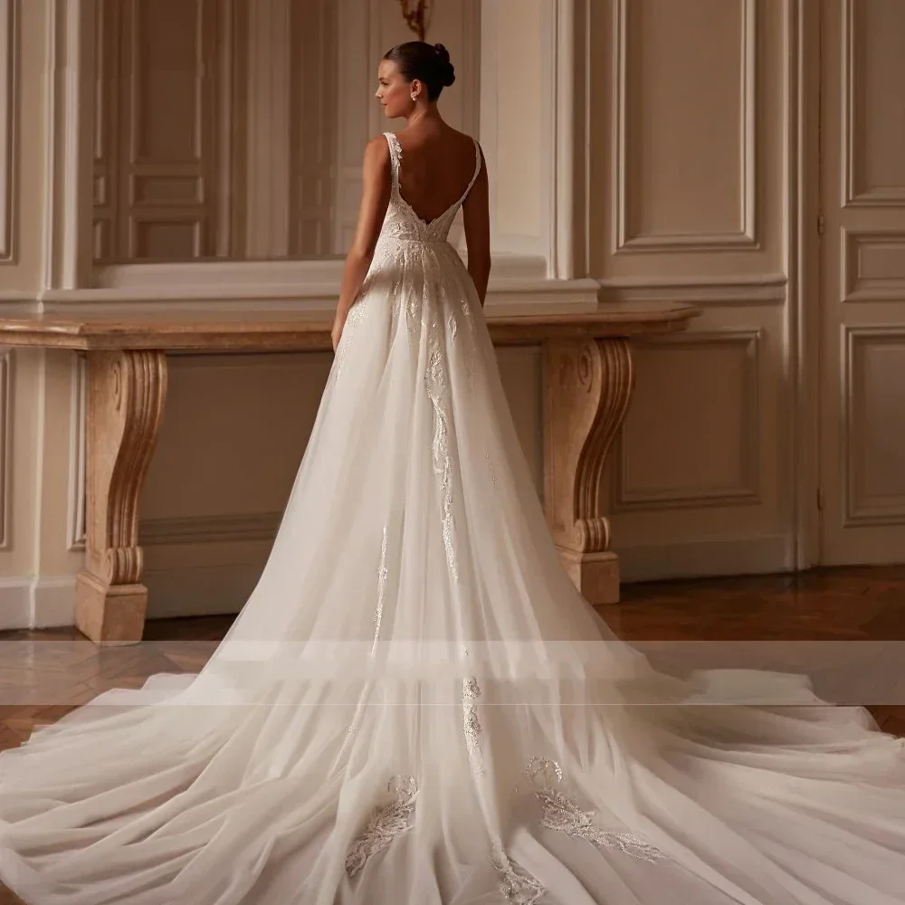 Abiti da sposa sexy personalizzati a sirena Abito da sposa con strascico staccabile con applicazioni senza maniche a cuore