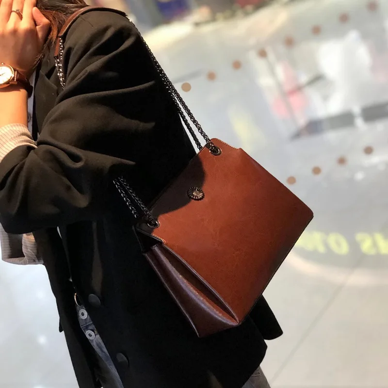 Bolsa de couro genuíno para mulheres, bolsa premium de correntes, design requintado, presente chique, real