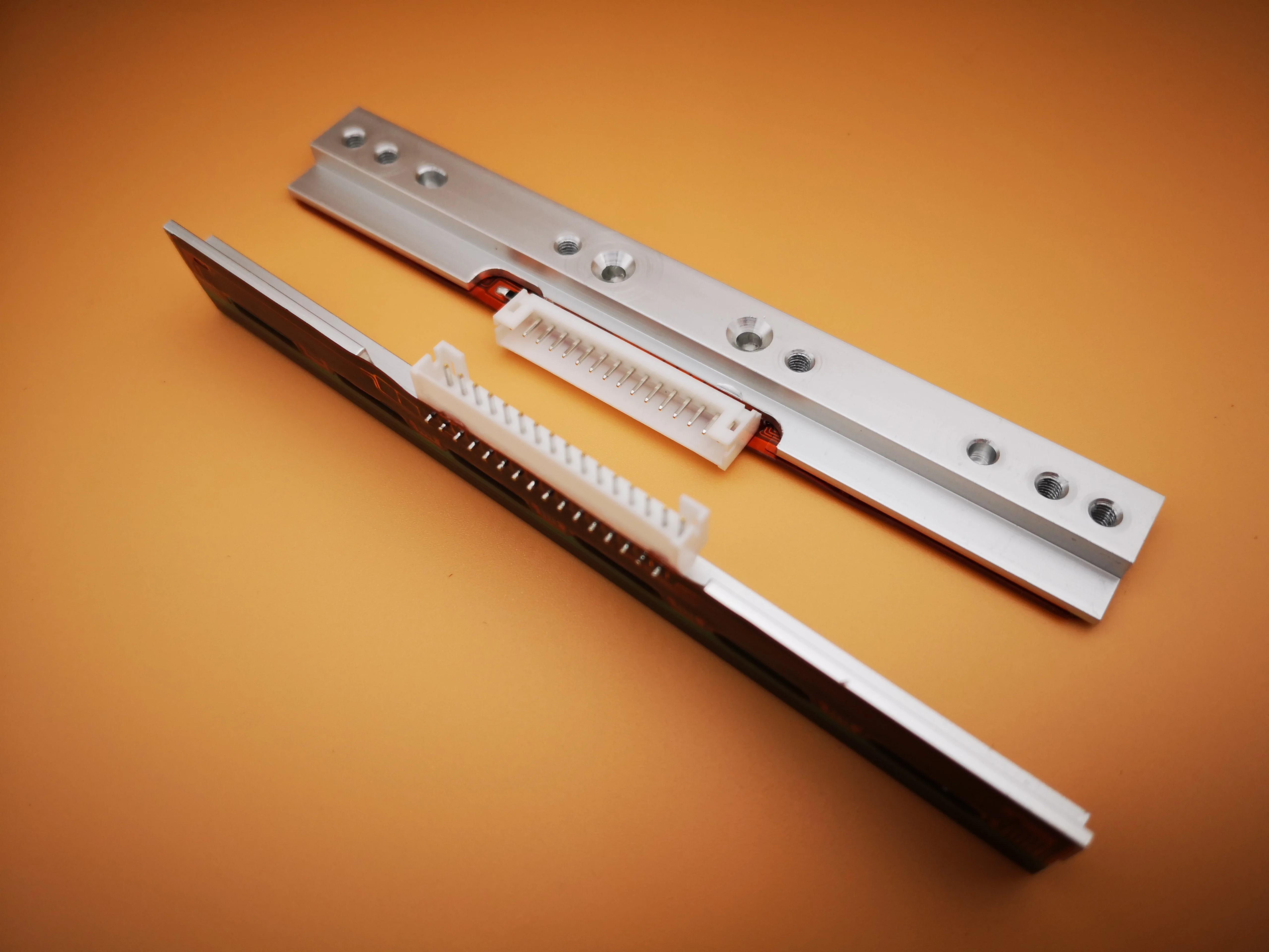 

Печатающая головка TA210 203DPI, новая оригинальная печатающая головка для TTP-245C 203DPI T200E T4402 T4502 G210 TA200