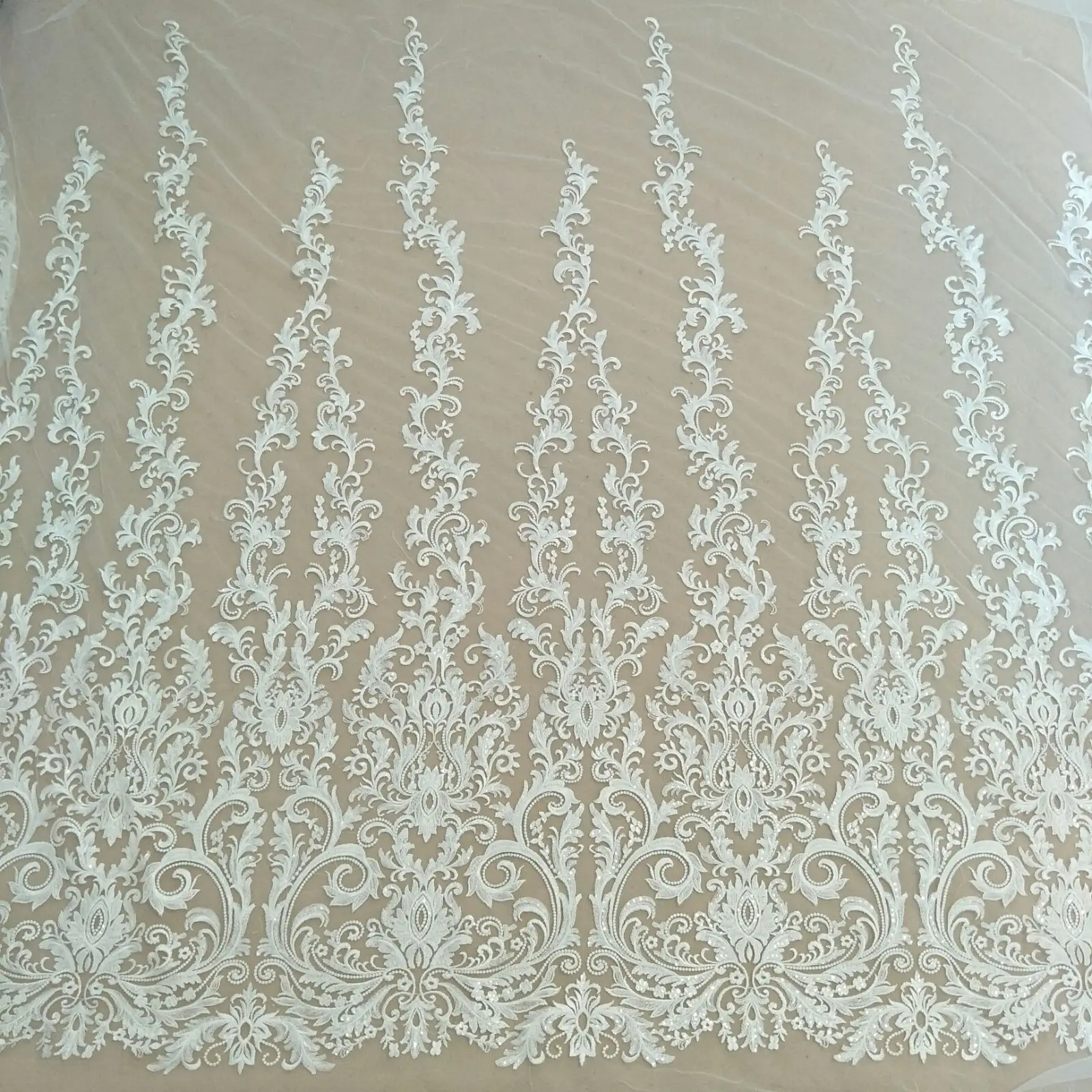 2024 The latest symmetrical diy wedding dress lace with sequins 130cm width sell by yard