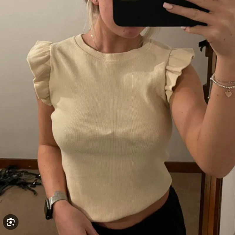 Camicetta da donna 2025 Corsetto da donna con volant a maniche corte Top femminile in maglia O-Collo stile street Camicetta estiva femminile Crop Top carini